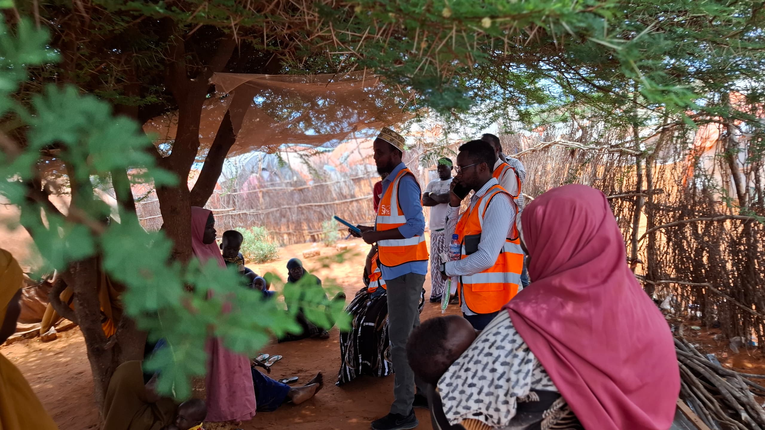 Rural community outreach under trees